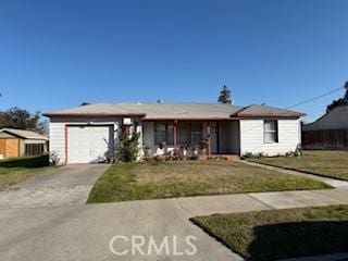 469 Cedar Ave, Atwater, CA 95301 - ranch-style home featuring a front yard and a garage
