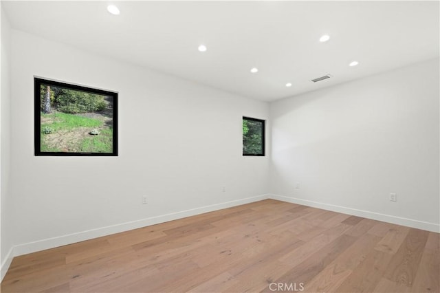 empty room featuring light hardwood / wood-style floors