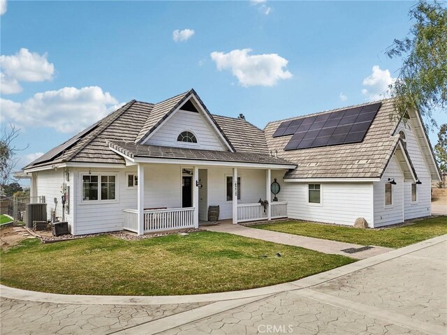 4210 Crestview Dr, Norco, CA 92860 - view of front of property featuring a porch, solar panels, and a front lawn