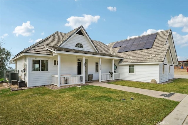 4210 Crestview Dr, Norco, CA 92860 - view of front of home with a porch, solar panels, and a front lawn