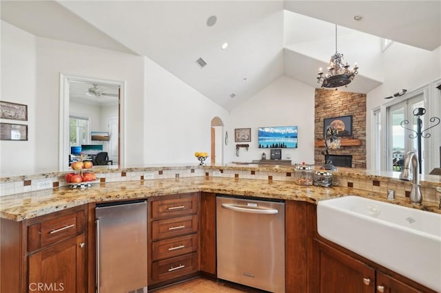 4210 Crestview Dr, Norco, CA 92860 - kitchen featuring plenty of natural light, vaulted ceiling, open floor plan, dishwasher, and a chandelier