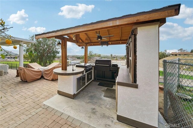 4210 Crestview Dr, Norco, CA 92860 - view of patio / terrace with an outdoor kitchen and ceiling fan