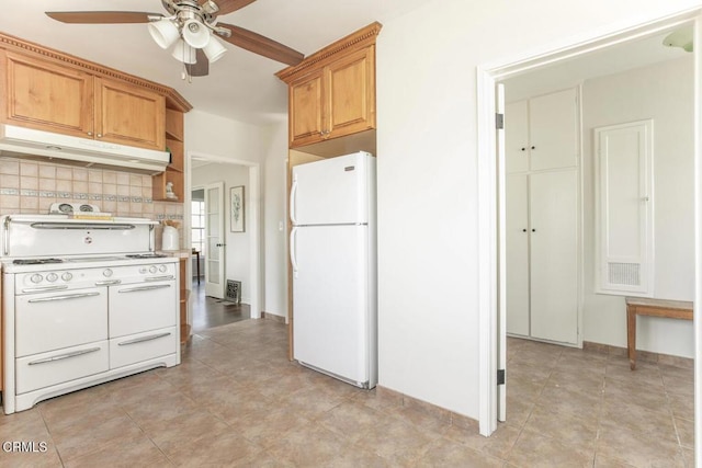 kitchen featuring white appliances, tasteful backsplash, baseboards, a ceiling fan, and under cabinet range hood