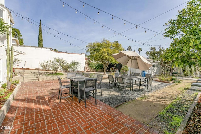 view of patio / terrace featuring a fenced backyard and outdoor dining area