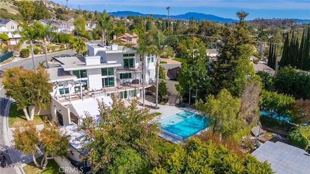 birds eye view of property featuring a residential view and a mountain view