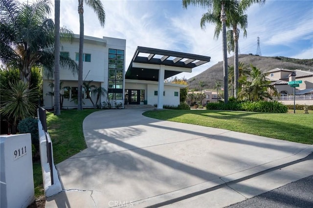 exterior space featuring concrete driveway