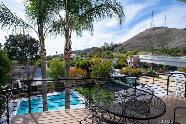 balcony featuring a mountain view