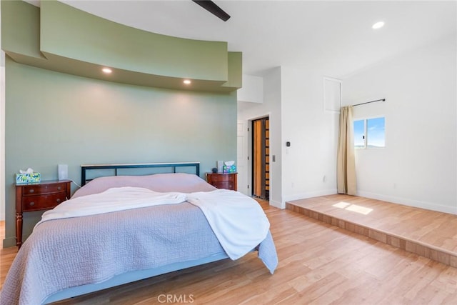 bedroom with a ceiling fan, light wood-style flooring, recessed lighting, and baseboards