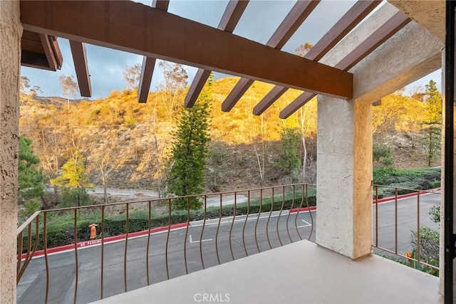 view of patio / terrace with a balcony