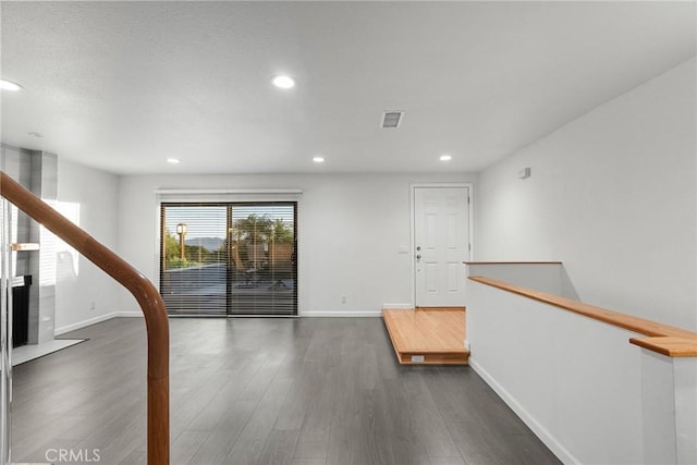 interior space with dark wood-type flooring