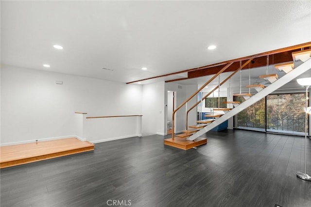 basement with dark wood-type flooring