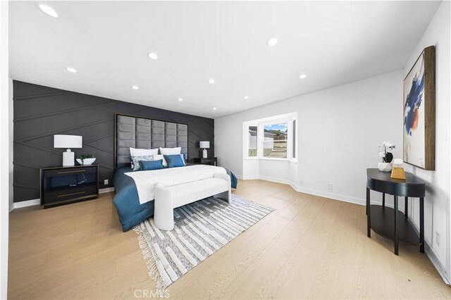 bedroom featuring light wood-type flooring