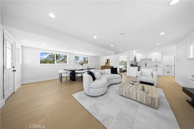 living room featuring light wood-type flooring