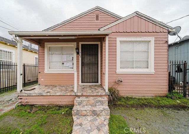 view of front of home with fence