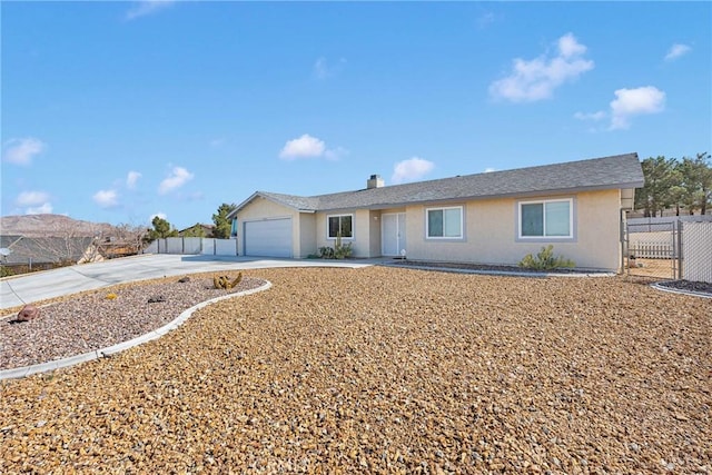 single story home with a garage