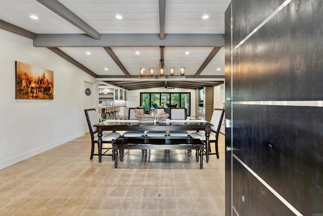 dining room with lofted ceiling with beams