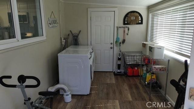 510 Adele Dr, Barstow, CA 92311 - washroom featuring washing machine and clothes dryer and wood finished floors
