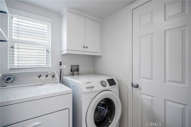 40241 Courtland Way, Temecula, CA 92591 - laundry area featuring washing machine and clothes dryer and cabinets