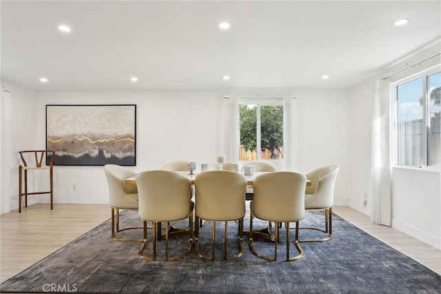 dining area with light wood-type flooring