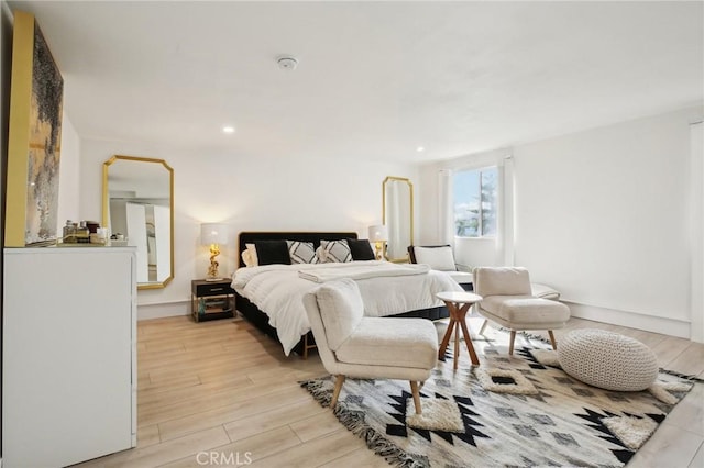 bedroom featuring light wood-type flooring