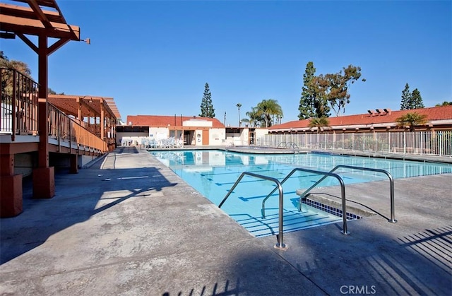 view of pool featuring a patio area