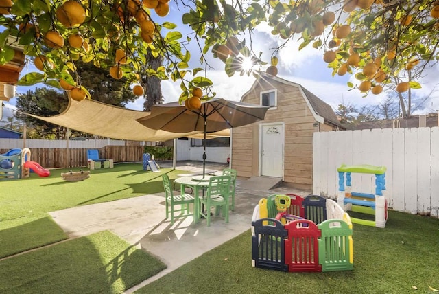 exterior space with a storage unit and a playground