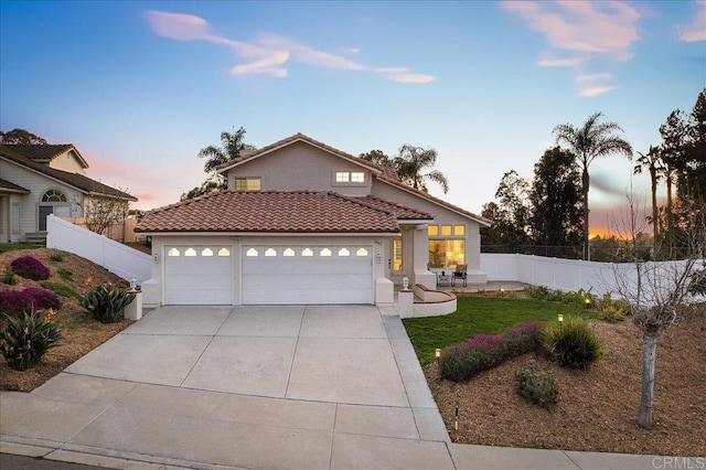 view of front of home featuring a garage