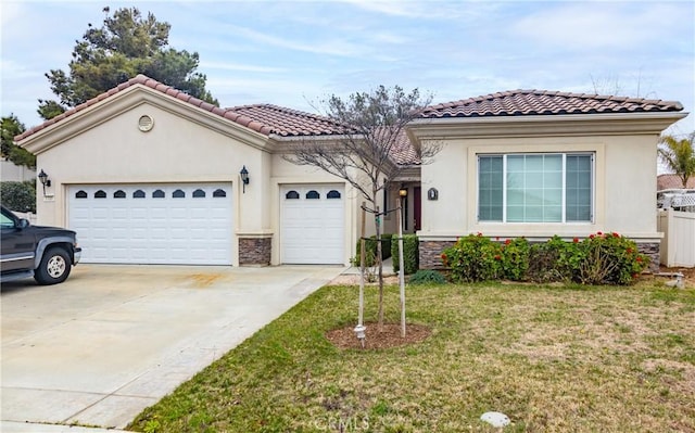 mediterranean / spanish-style home with a garage, a front yard, driveway, and stucco siding