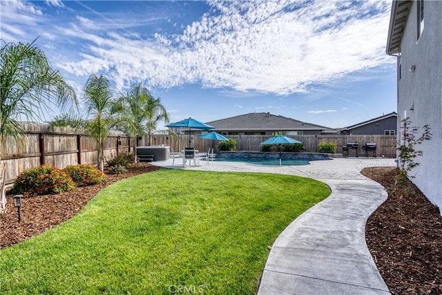 view of yard featuring pool water feature and a patio area