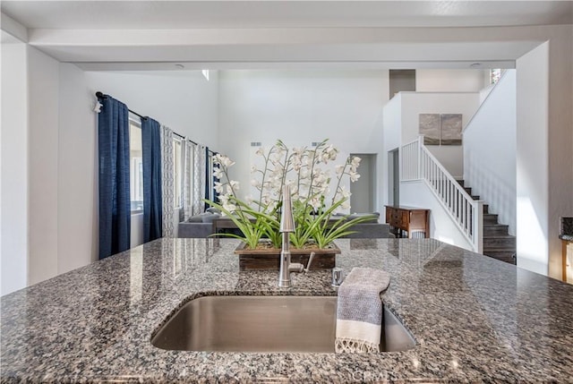 kitchen featuring dark stone counters