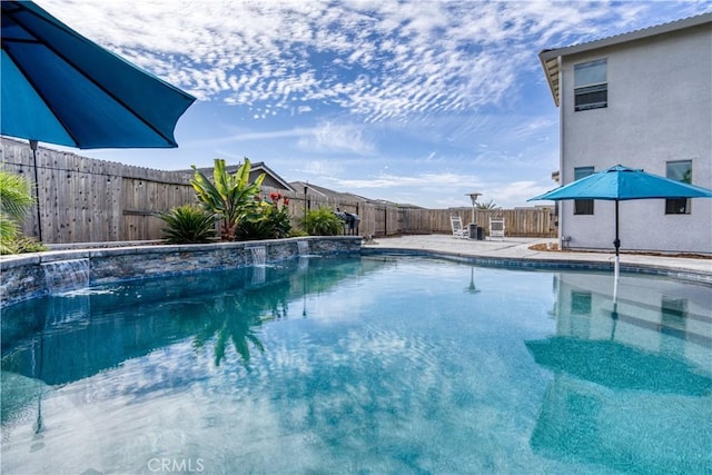 view of pool with pool water feature