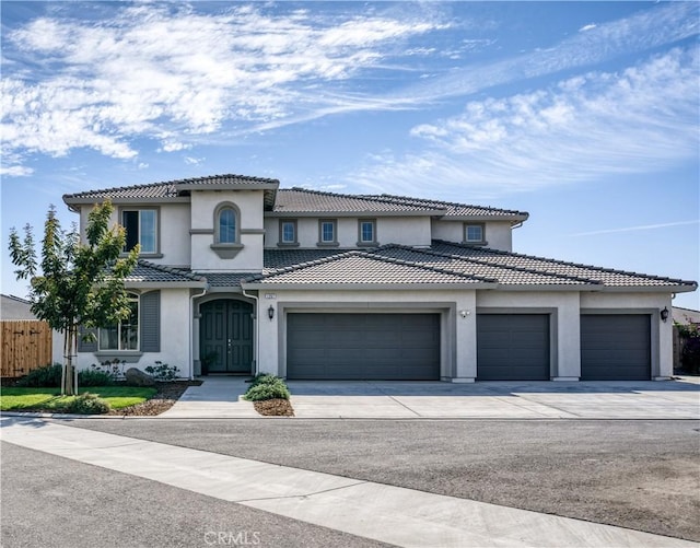 mediterranean / spanish-style house featuring a garage