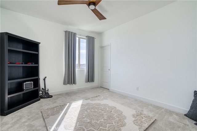 interior space featuring ceiling fan