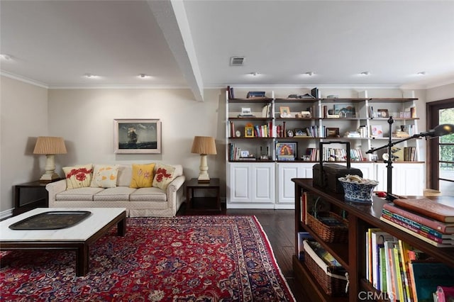 living room with crown molding, dark wood finished floors, and visible vents