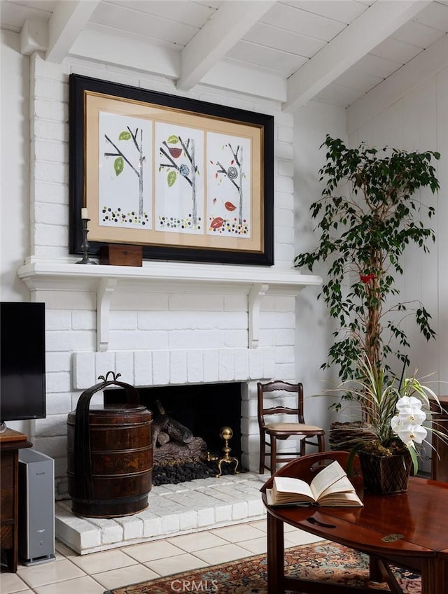 room details with wooden ceiling, a fireplace, and beamed ceiling