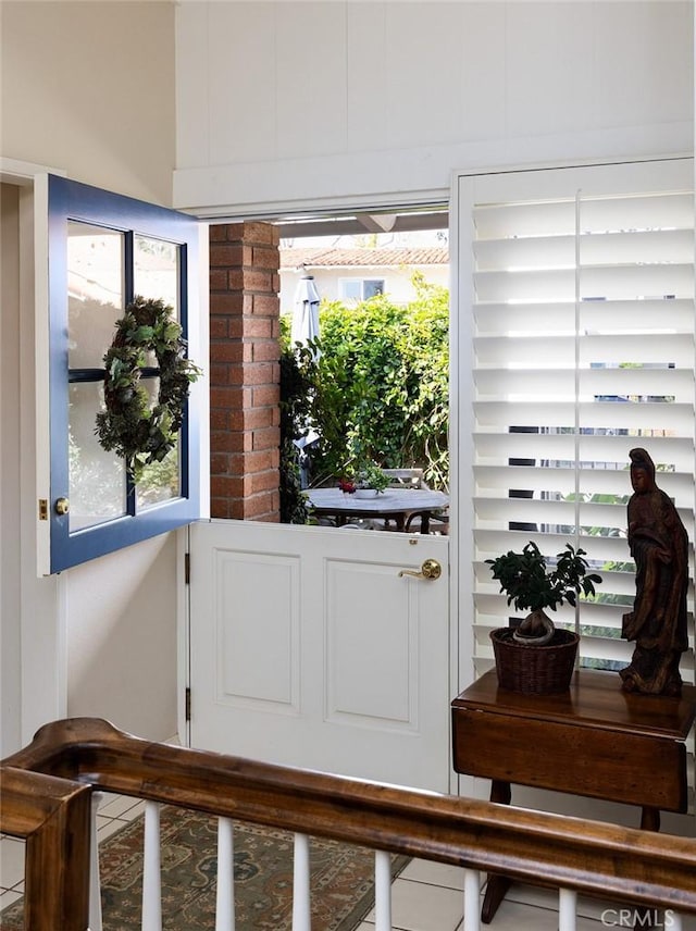 doorway to outside featuring plenty of natural light