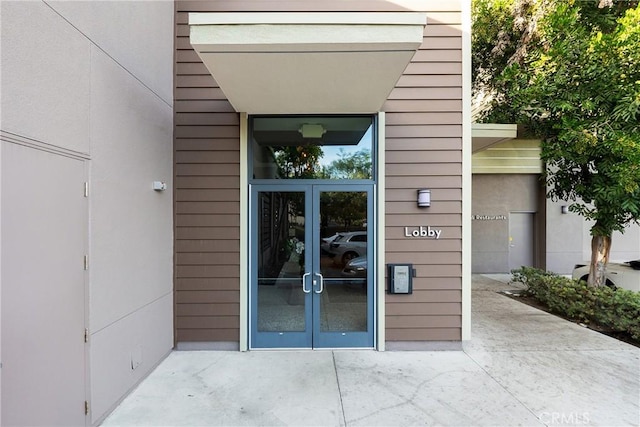 doorway to property with french doors