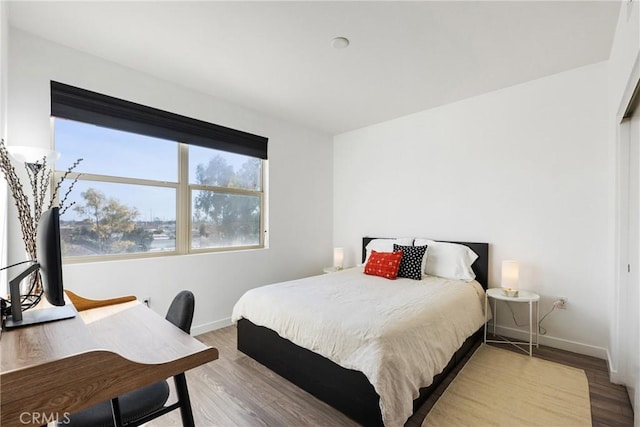 bedroom featuring light hardwood / wood-style floors