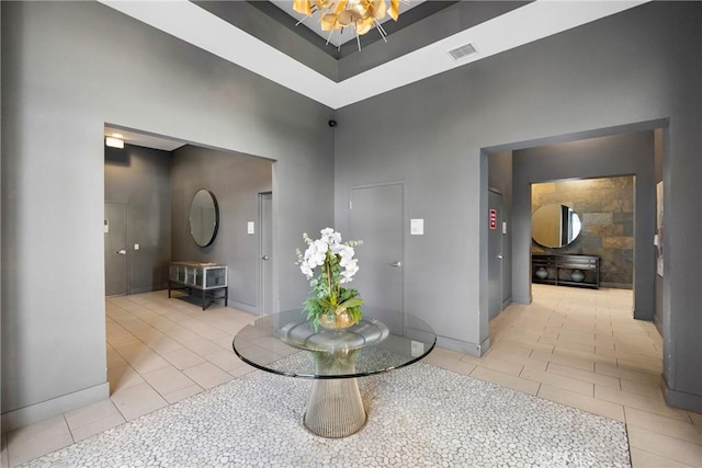 hallway with light tile patterned flooring