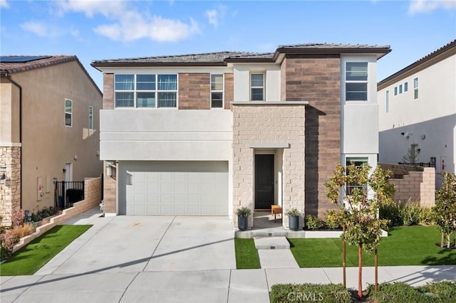 contemporary home with an attached garage, driveway, stone siding, and stucco siding