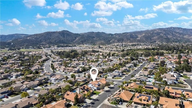 aerial view with a residential view and a mountain view