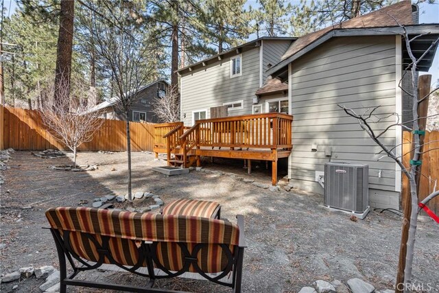 1707 Twin Lakes Dr, Wrightwood, CA 92397 - back of house with a fenced backyard, a deck, and central air condition unit