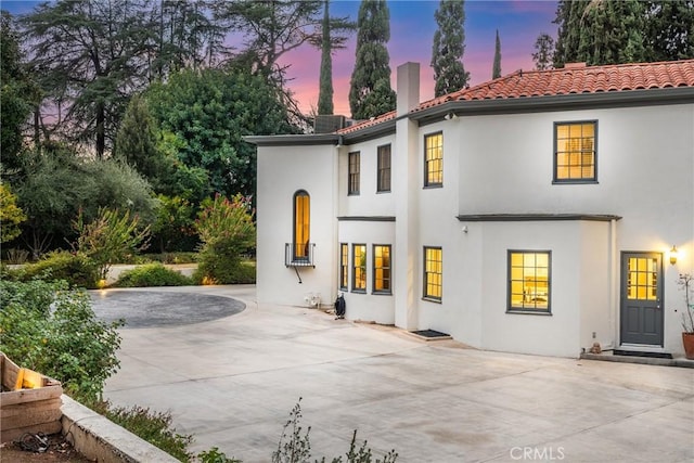 1205 W Highland Ave, Redlands, CA 92373 - rear view of property featuring a patio area, a tiled roof, and stucco siding
