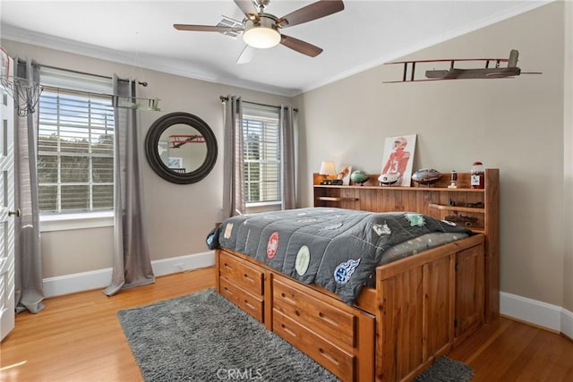 1205 W Highland Ave, Redlands, CA 92373 - bedroom with baseboards, light wood-style flooring, crown molding, ceiling fan, and lofted ceiling