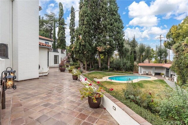 1205 W Highland Ave, Redlands, CA 92373 - swimming pool with a patio area and a yard