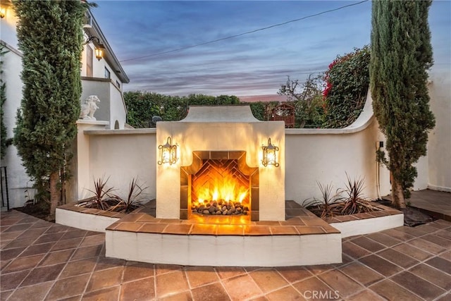 1205 W Highland Ave, Redlands, CA 92373 - view of patio with a tiled fireplace