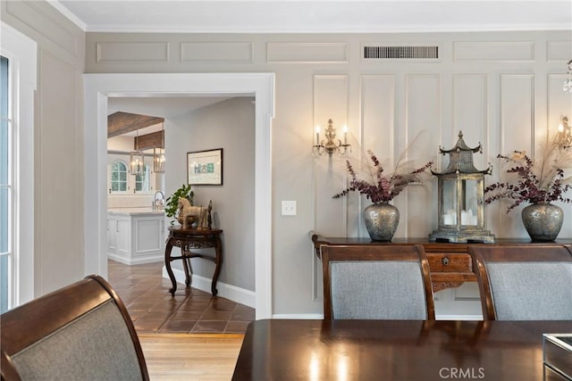 1205 W Highland Ave, Redlands, CA 92373 - detailed view of a chandelier and baseboards