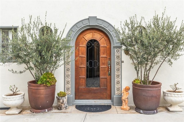 1205 W Highland Ave, Redlands, CA 92373 - doorway to property featuring stucco siding
