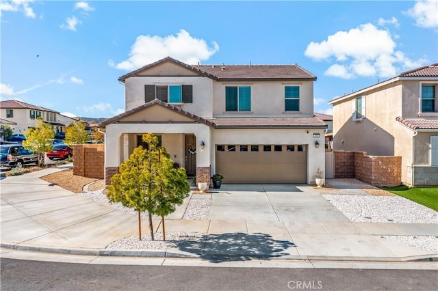 traditional-style home featuring stucco siding, an attached garage, central AC unit, and driveway