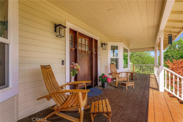 wooden terrace with covered porch